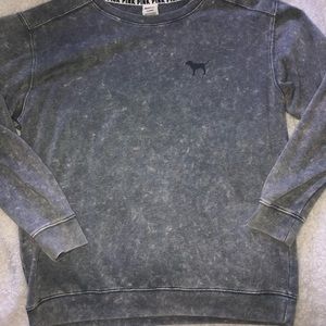 Pink crew neck with “acid wash” look.